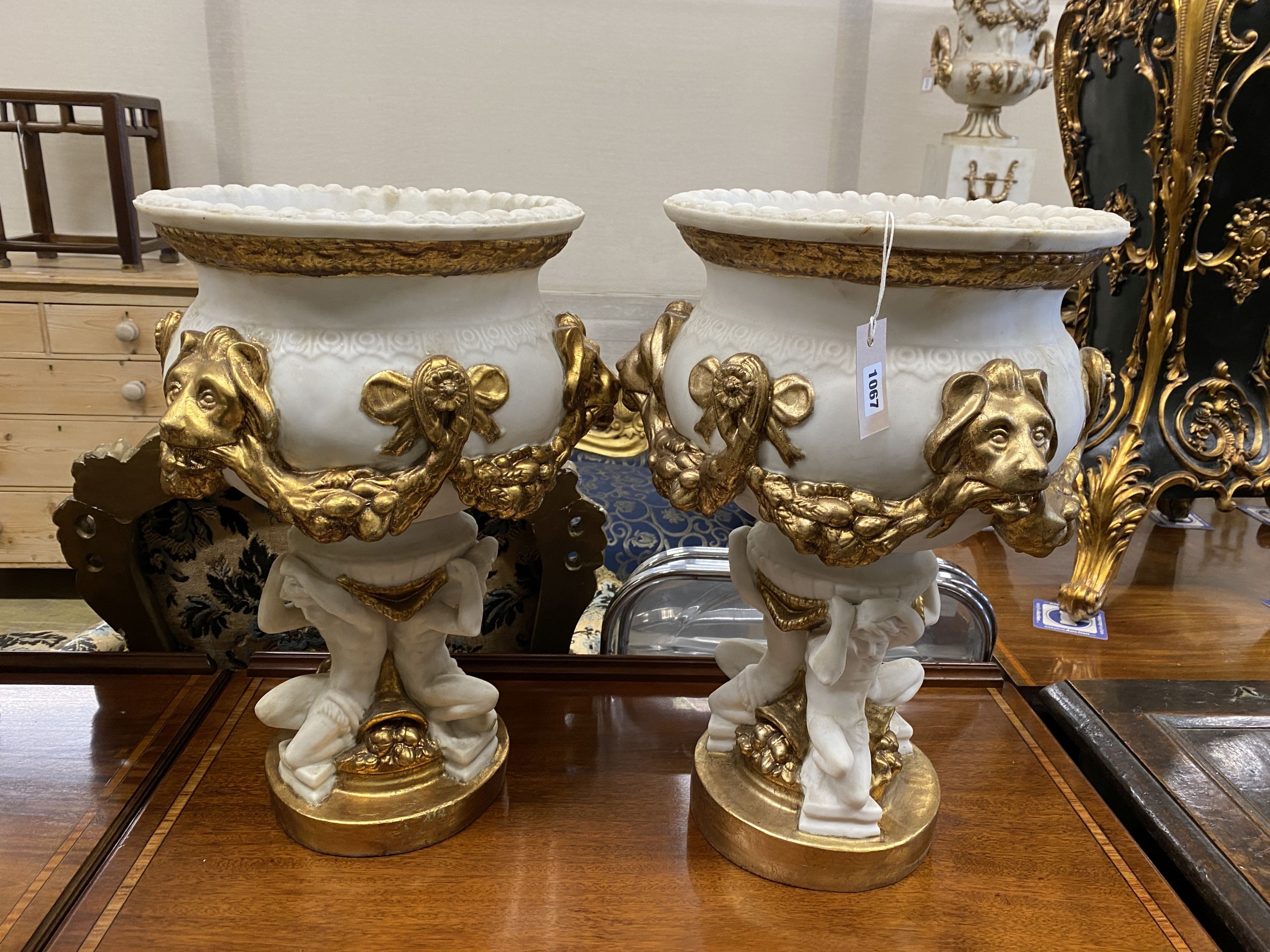A set of four composition faux marble planters, diameter 38cm, height 54cm